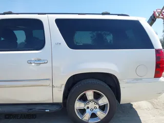 2008 Chevrolet Suburban LTZ with VIN 1GNFC16058R198040, listed as a IAAI auction lot 41421238 with 215,591 mi miles. Bid and sale history available at carsss.com. Image 6.