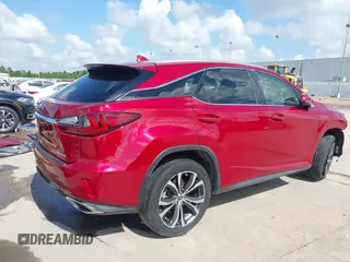 2019 Lexus RX 350 with VIN 2T2ZZMCA0KC139977, listed as a IAAI auction lot 42367672 with 100,312 mi miles and . Bid and sale history available at DreamBid. Image 4.