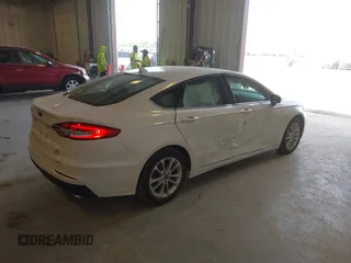 2020 Ford Fusion SE with VIN 3FA6P0HD4LR165511, listed as a IAAI auction lot 42136252 with 30,709 mi miles and . Bid and sale history available at DreamBid. Image 4.
