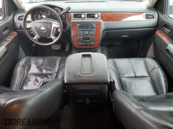 2013 Chevrolet Suburban LT with VIN 1GNSKJE77DR131188, listed as a Copart auction lot 52880375 with 147,278 mi miles and Salvage Title. Bid and sale history available at DreamBid. Image 8.