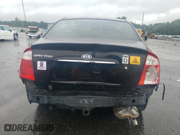 2005 Kia Spectra LX with VIN KNAFE121055134568, listed as a Copart auction lot 71541244 with 146,751 mi miles and Salvage Title. Bid and sale history available at carsss.com. Image 6.