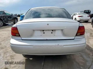 2002 Saturn SL с VIN 1G8ZH52892Z242469, выставлен на аукционе Copart как лот 59973755 с пробегом Не указан миль и Списание • Salvage title. История ставок и продаж доступна на DreamBid. Изображение 6.