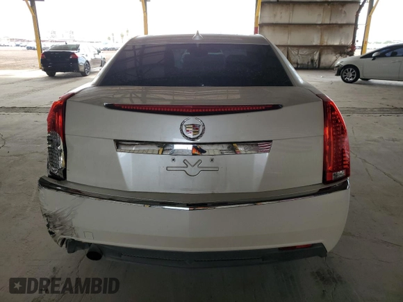 2012 Cadillac CTS with VIN 1G6DA5E52C0131731, listed as a Copart auction lot 59223235 with 104,521 mi miles and Salvage title. Bid and sale history available at DreamBid. Image 6.