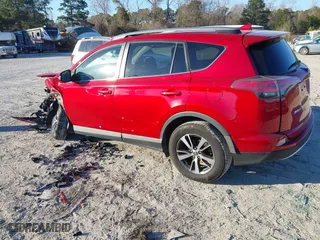 2017 Toyota RAV4 XLE with VIN 2T3RFREV7HW661708, listed as a IAAI auction lot 41367714 with 121,457 mi miles. Bid and sale history available at carsss.com. Image 3.