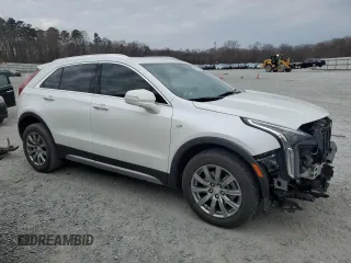 2021 Cadillac XT4 FWD Premium Luxury with VIN 1GYFZCR43MF032297, listed as a Copart auction lot 47379085 with 36,065 mi miles and Salvage Title. Bid and sale history available at DreamBid. Image 4.
