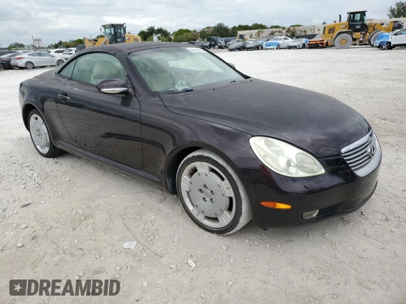 2002 Lexus SC 430 with VIN JTHFN48Y720002987, listed as a Copart auction lot 55450785 with 91,164 mi miles and Salvage title. Bid and sale history available at DreamBid. Image 4.