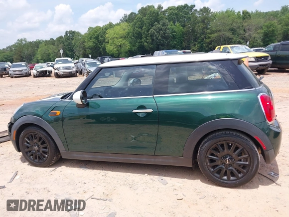 2014 MINI Hardtop with VIN WMWXM5C53ET972847, listed as a IAAI auction lot 42502121 with 165,475 mi miles and . Bid and sale history available at DreamBid. Image 14.