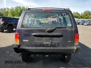 1999 Jeep Cherokee SE with VIN 1J4FF28S0XL541871, listed as a Copart auction lot 59250264 with Not provided miles and Salvage title. Bid and sale history available at DreamBid. Image 6.