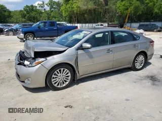 2015 Toyota Avalon Hybrid XLE Touring with VIN 4T1BD1EB9FU043021, listed as a Copart auction lot 51470045 with 105,345 mi miles and Salvage Title. Bid and sale history available at carsss.com. Image 1.