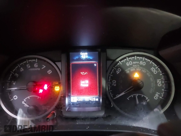 2016 Toyota Tacoma SR5 with VIN 3TMDZ5BNXGM009423, listed as a IAAI auction lot 41008068 with 107,426 mi miles and . Bid and sale history available at DreamBid. Image 7.