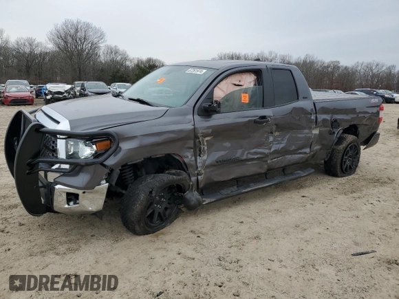 2021 Toyota Tundra SR with VIN 5TFUY5F18MX012725, listed as a Copart auction lot 52550205 with 54,727 mi miles and Salvage title. Bid and sale history available at DreamBid. Image 1.