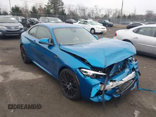 2021 BMW M2 Competition with VIN WBS2U7C02M7H63454, listed as a IAAI auction lot 41063808 with 15,047 mi miles. Bid and sale history available at carsss.com. Image 1.