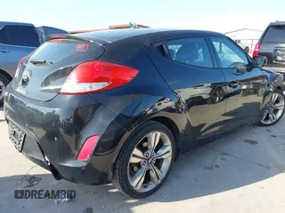2013 Hyundai Veloster w/Black Int with VIN KMHTC6AD2DU171044, listed as a IAAI auction lot 42245907 with 140,542 mi miles and . Bid and sale history available at DreamBid. Image 4.