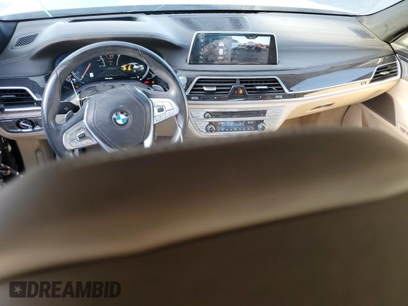 2016 BMW 7 Series 740i z VIN WBA7E2C53GG504611, wystawiony jako Copart lot #42253395 z przebiegiem 35 965 mil mil oraz Szkoda całkowita • Salvage title. Historia ofert i sprzedaży dostępna na DreamBid. Obrazek 8.