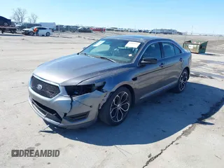 2013 Ford Taurus SHO с VIN 1FAHP2KT0DG220825, выставлен на аукционе IAAI как лот 41851095 с пробегом 163 797 миль миль и . История ставок и продаж доступна на DreamBid. Изображение 18.