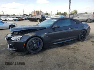 2016 BMW M6 z VIN WBS6G9C57GD932144, wystawiony jako Copart lot #72273744 z przebiegiem 71 614 mil mil oraz Szkody całkowita. Historia ofert i sprzedaży dostępna na DreamBid. Obrazek 1.