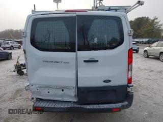 2015 Ford Transit Cargo with VIN 1FTNR1ZM2FKB13159, listed as a IAAI auction lot 41331967 with 152,715 mi miles and . Bid and sale history available at DreamBid. Image 16.
