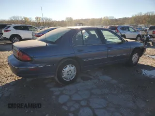 1997 Chevrolet Lumina LS with VIN 2G1WL52M0V1100215, listed as a Copart auction lot 78924694 with 200,402 mi miles and Salvage Title. Bid and sale history available at DreamBid. Image 3.
