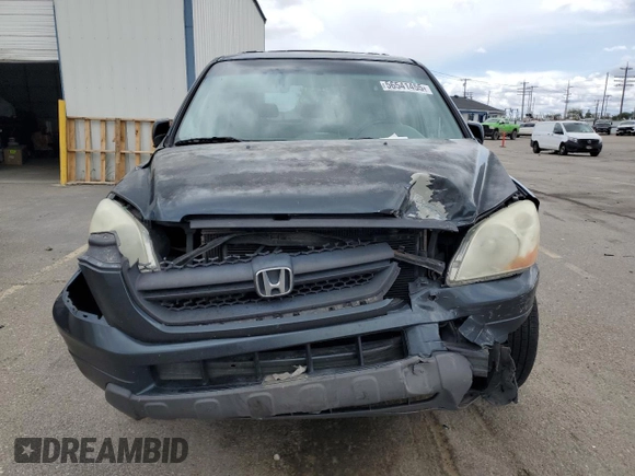 2003 Honda Pilot EX z VIN 2HKYF18563H543125, wystawiony jako Copart lot #56541455 z przebiegiem 241 804 mil mil oraz Szkoda całkowita • Salvage title. Historia ofert i sprzedaży dostępna na DreamBid. Obrazek 5.