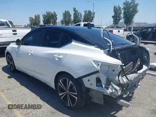 2021 Nissan Sentra SR z VIN 3N1AB8DV0MY245835, wystawiony jako IAAI lot #42320378 z przebiegiem 100 949 mil mil oraz . Historia ofert i sprzedaży dostępna na DreamBid. Obrazek 3.