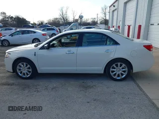 2012 Lincoln MKZ with VIN 3LNHL2JC4CR831614, listed as a IAAI auction lot 41883378 with 92,819 mi miles. Bid and sale history available at carsss.com. Image 14.