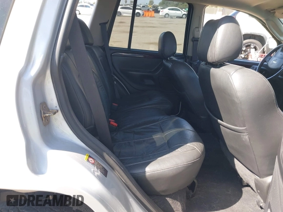 2004 Jeep Grand Cherokee Limited with VIN 1J8GW58N44C390592, listed as a IAAI auction lot 42150161 with Not provided miles and . Bid and sale history available at DreamBid. Image 8.