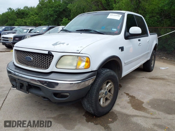 2002 Ford F-150 XLT with VIN 1FTRW08L02KE29411, listed as a IAAI auction lot 42133550 with 270,752 mi miles. Bid and sale history available at carsss.com. Image 2.