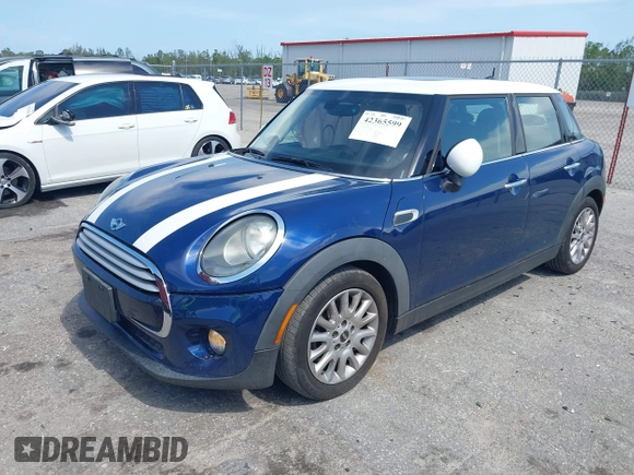 2015 MINI Hardtop 4 Door with VIN WMWXS5C51FT827510, listed as a IAAI auction lot 42365599 with 53,667 mi miles and . Bid and sale history available at DreamBid. Image 2.