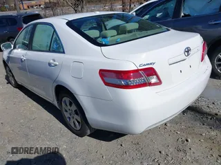 2010 Toyota Camry with VIN 4T1BF3EKXAU512860, listed as a IAAI auction lot 41590070 with 212,659 mi miles and . Bid and sale history available at DreamBid. Image 3.