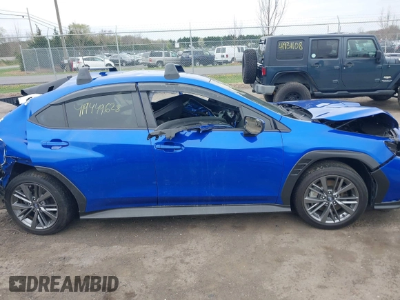 2023 Subaru WRX z VIN JF1VBAA65P9812785, wystawiony jako IAAI lot #41944628 z przebiegiem 15 080 mil mil oraz . Historia ofert i sprzedaży dostępna na DreamBid. Obrazek 12.
