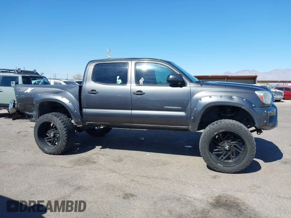 2014 Toyota Tacoma PreRunner with VIN 3TMJU4GN3EM165840, listed as a IAAI auction lot 41666871 with 150,333 mi miles and . Bid and sale history available at DreamBid. Image 14.