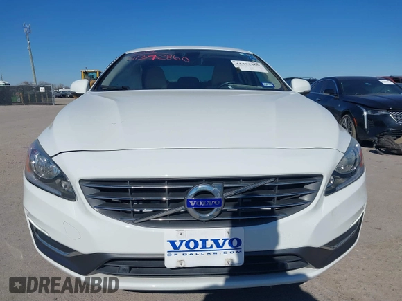 2015 Volvo S60 T5 Drive-E Premier z VIN YV140MFKXF1351769, wystawiony jako IAAI lot #41392860 z przebiegiem 56 920 mil mil oraz . Historia ofert i sprzedaży dostępna na DreamBid. Obrazek 12.