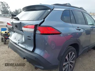 2022 Toyota Corolla Cross XLE with VIN 7MUDAABG6NV007009, listed as a IAAI auction lot 42409061 with 37,178 mi miles and . Bid and sale history available at DreamBid. Image 18.