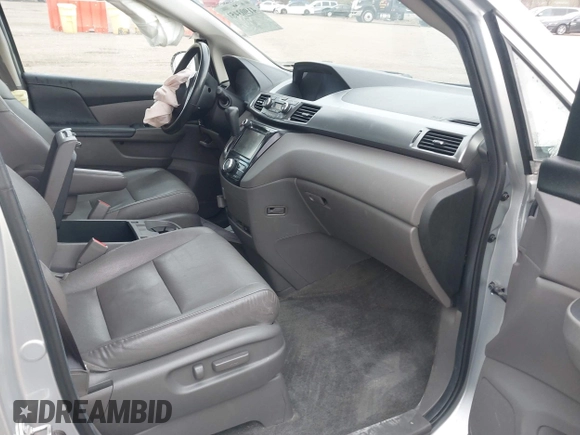 2014 Honda Odyssey EX-L with VIN 5FNRL5H65EB096544, listed as a IAAI auction lot 41903451 with 99,628 mi miles and . Bid and sale history available at carsss.com. Image 5.