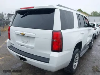 2017 Chevrolet Tahoe LT with VIN 1GNSCBKC1HR200807, listed as a IAAI auction lot 41917005 with 129,910 mi miles. Bid and sale history available at carsss.com. Image 4.