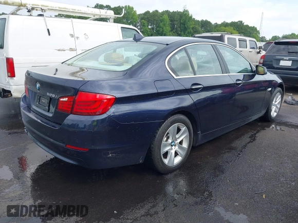 2013 BMW 5 Series 528i xDrive with VIN WBAXH5C52DD115352, listed as a IAAI auction lot 42501265 with 122,421 mi miles and . Bid and sale history available at DreamBid. Image 4.