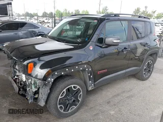 2016 Jeep Renegade Trailhawk z VIN ZACCJBCT0GPD76536, wystawiony jako IAAI lot #42341470 z przebiegiem 158 091 mil mil oraz . Historia ofert i sprzedaży dostępna na DreamBid. Obrazek 2.