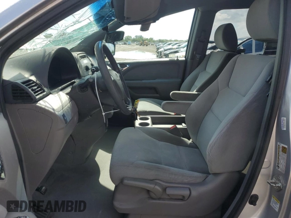 2010 Honda Odyssey LX with VIN 5FNRL3H28AB083511, listed as a Copart auction lot 55704745 with 81,218 mi miles and Salvage title. Bid and sale history available at DreamBid. Image 7.
