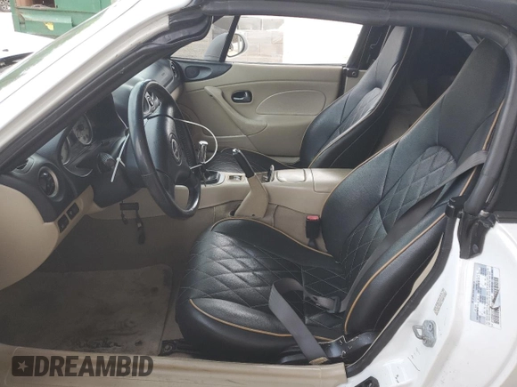 2004 Mazda MX-5 Miata LS z VIN JM1NB353640407864, wystawiony jako Copart lot #53951315 z przebiegiem 116 295 mil mil oraz Szkoda całkowita • Salvage title. Historia ofert i sprzedaży dostępna na DreamBid. Obrazek 7.