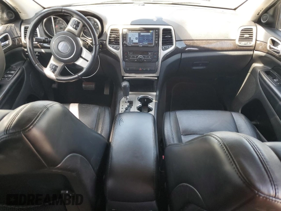 2012 Jeep Grand Cherokee Laredo with VIN 1C4RJEAG0CC104004, listed as a Copart auction lot 53734675 with 150,216 mi miles and Salvage Title. Bid and sale history available at carsss.com. Image 8.