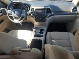 2014 Jeep Grand Cherokee Laredo with VIN 1C4RJEAG7EC274573, listed as a Copart auction lot 52637255 with 156,409 mi miles and Salvage Title. Bid and sale history available at DreamBid. Image 8.