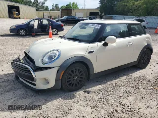 2018 MINI Hardtop Cooper with VIN WMWXP5C58J2G62719, listed as a Copart auction lot 57464935 with 82,769 mi miles and Salvage title. Bid and sale history available at DreamBid. Image 1.