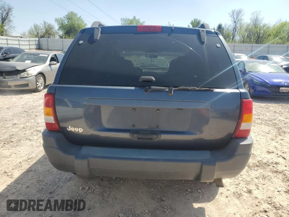 2003 Jeep Grand Cherokee Laredo with VIN 1J4GX48S83C504543, listed as a Copart auction lot 52723835 with 220,574 mi miles and Clean Title. Bid and sale history available at carsss.com. Image 6.