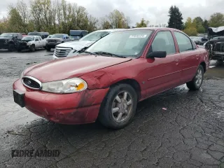 2000 Ford Contour SE Fleet z VIN 1FAFP6636YK142708, wystawiony jako Copart lot #77976124 z przebiegiem 126 879 mil mil oraz Szkody całkowita. Historia ofert i sprzedaży dostępna na DreamBid. Obrazek 1.