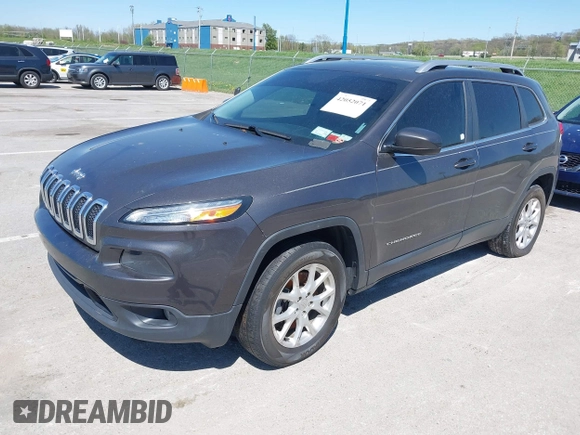 2014 Jeep Cherokee Latitude with VIN 1C4PJMCS2EW137767, listed as a IAAI auction lot 42052071 with 165,300 mi miles and . Bid and sale history available at DreamBid. Image 17.