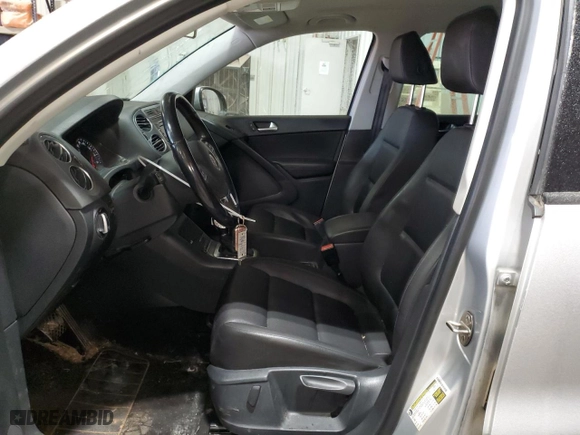 2015 Volkswagen Tiguan S with VIN WVGAV7AXXFW592518, listed as a Copart auction lot 44722005 with 123,810 mi miles and Salvage Title. Bid and sale history available at carsss.com. Image 7.