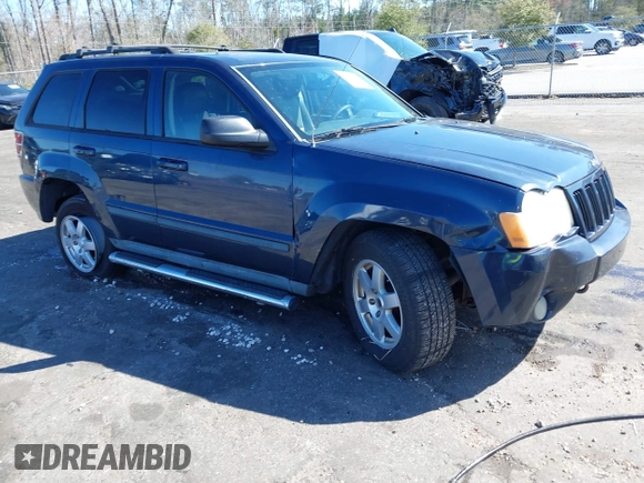 2009 Jeep Grand Cherokee Laredo with VIN 1J8HR48P19C540785, listed as a IAAI auction lot 41729851 with 205,504 mi miles. Bid and sale history available at carsss.com. Image 1.
