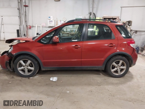 2009 Suzuki SX4 AWD z VIN JS2YB413295100359, wystawiony jako IAAI lot #40899442 z przebiegiem 109 919 mil mil oraz . Historia ofert i sprzedaży dostępna na DreamBid. Obrazek 14.