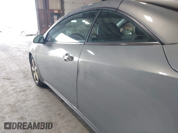 2007 Pontiac G6 GT z VIN 1G2ZH361X74127590, wystawiony jako IAAI lot #41828684 z przebiegiem 120 819 mil mil oraz . Historia ofert i sprzedaży dostępna na DreamBid. Obrazek 18.