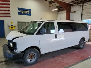 2012 Chevrolet Express Passenger 1LT z VIN 1GAZG1FG6C1139148, wystawiony jako Copart lot #54662595 z przebiegiem 449 617 mil mil oraz Szkody całkowita. Historia ofert i sprzedaży dostępna na DreamBid. Obrazek 1.